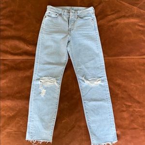 Levis High Waisted Light Washed Ripped Knee Jean